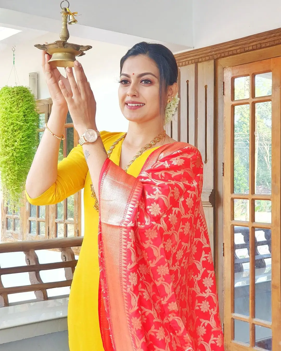 Anusree Nair In South Indian Traditional Yellow Gown